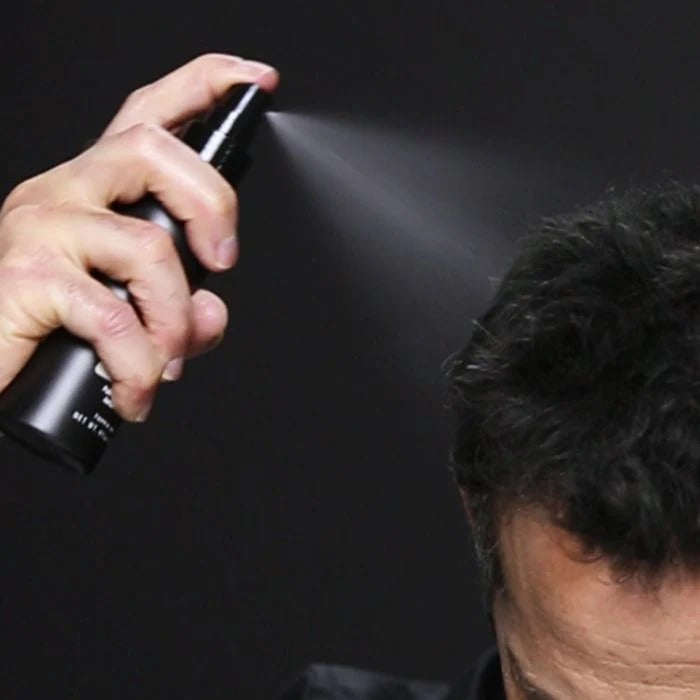 Spray fixateur